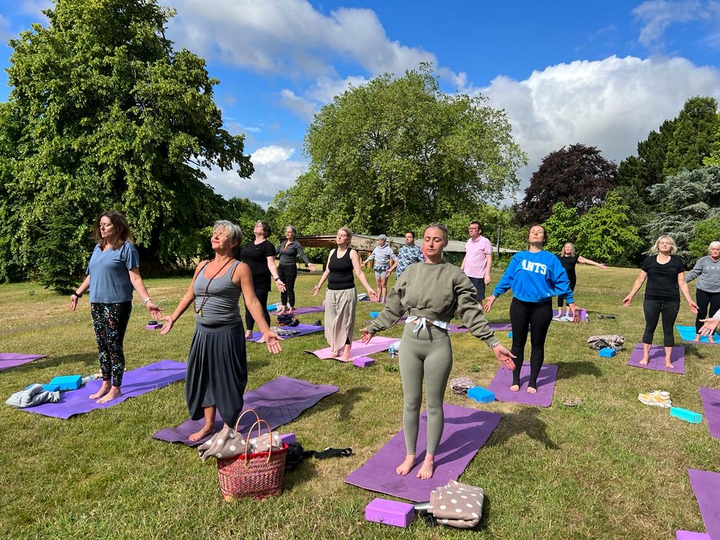 Group outdoor yoga class